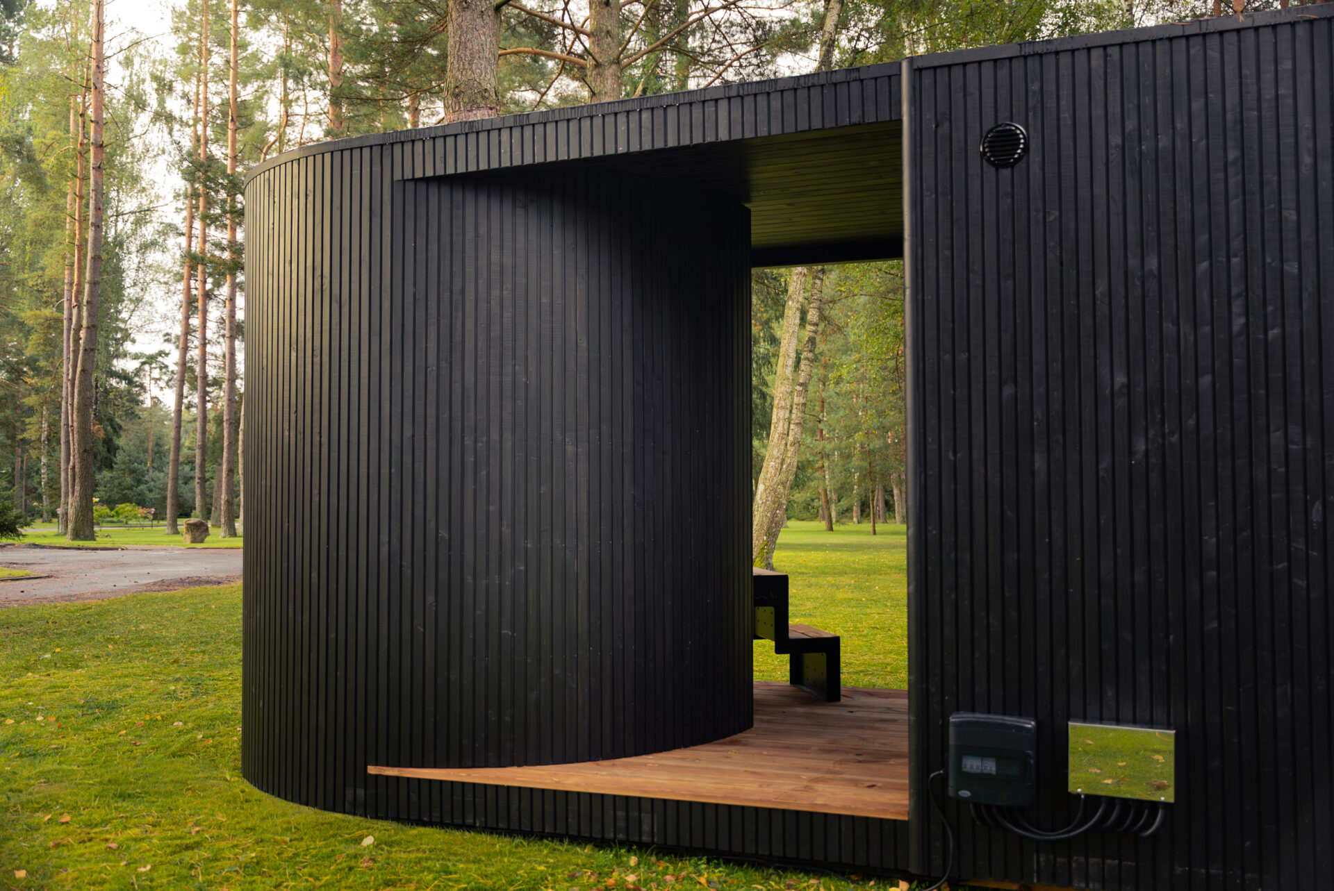 Tauras 2×1 sauna with hot tub by Celsium set within a calm forest landscape