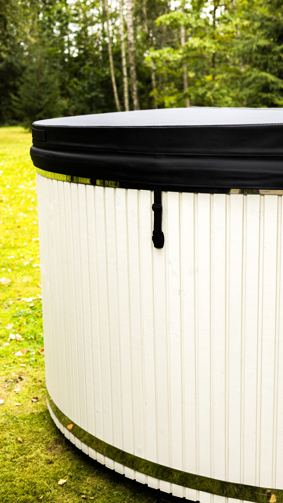 Benas hot tub by Celsium set within a calm forest landscape