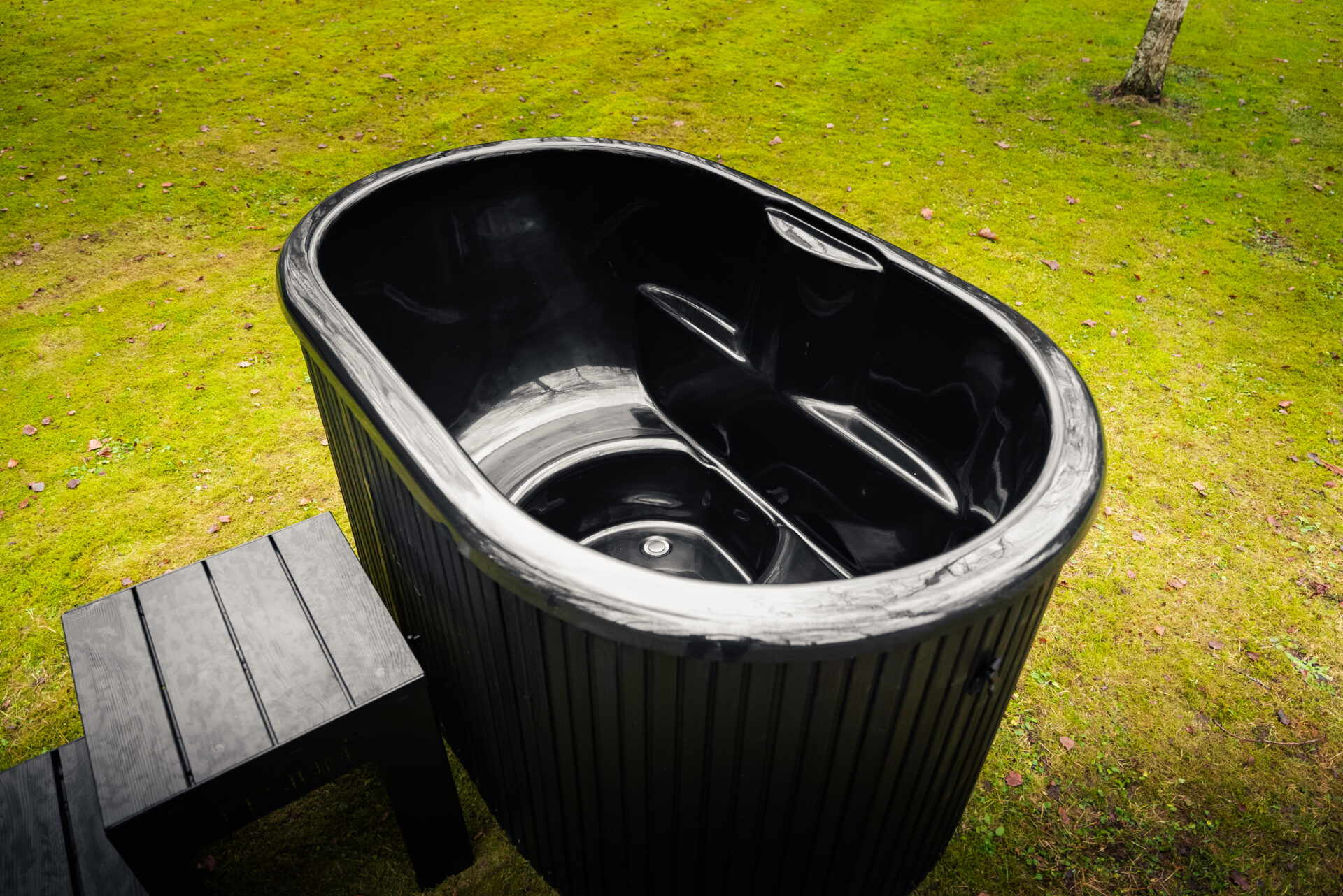 A calm ice plunge experience immersed in the stillness of the forest